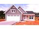 Charming single-story home with a two-car garage and a covered porch, blending modern design with a cozy feel at 33 Cambridge Ln, Dallas, GA 30157