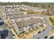 An aerial view showcasing the neighborhood's well-maintained townhomes, streets, and landscaping at 4358 White Spruce Aly, Doraville, GA 30360