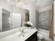 Comfortable bathroom features a single vanity, bathtub and shower combo, with neutral tones at 4358 White Spruce Aly, Doraville, GA 30360
