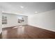 Bright living room featuring hardwood floors and sunlit windows at 4358 White Spruce Aly, Doraville, GA 30360