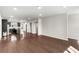 Spacious living room with hardwood flooring, natural light, and recessed lighting at 4358 White Spruce Aly, Doraville, GA 30360