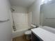 Bright bathroom with a tub/shower combo, large mirror, and neutral-toned walls at 585 Mcwilliams Se Rd # 2602, Atlanta, GA 30315