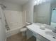 Clean bathroom with tub/shower combo, large mirror, and a neutral color scheme at 585 Mcwilliams Se Rd # 2602, Atlanta, GA 30315
