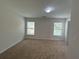 Spacious bedroom with neutral carpet and natural light from two large windows at 585 Mcwilliams Se Rd # 2602, Atlanta, GA 30315