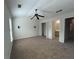 Spacious carpeted bedroom with a ceiling fan, closet, and attached bathroom at 585 Mcwilliams Se Rd # 2602, Atlanta, GA 30315