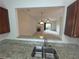 Open kitchen with granite countertops and stainless steel sink offering a view into the living area at 585 Mcwilliams Se Rd # 2602, Atlanta, GA 30315