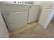 Laundry area with white washer and dryer appliances at 585 Mcwilliams Se Rd # 2602, Atlanta, GA 30315
