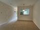 Bright living room featuring an open view to the kitchen, creating a seamless and connected living space at 585 Mcwilliams Se Rd # 2602, Atlanta, GA 30315