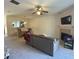 Spacious living room with a fireplace, neutral walls, and an open layout to the dining area at 585 Mcwilliams Se Rd # 2602, Atlanta, GA 30315