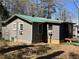 Side view of home with an exterior door visible at 8090 Colquitt St, Douglasville, GA 30134
