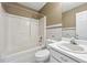 Bathroom featuring a shower and tub combination at 1056 Shadow Lake Dr, Lithonia, GA 30058