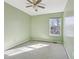 Bedroom featuring natural light and a ceiling fan at 1056 Shadow Lake Dr, Lithonia, GA 30058