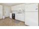 Clean kitchen featuring white cabinetry and modern appliances at 1056 Shadow Lake Dr, Lithonia, GA 30058