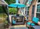 The backyard includes a barbecue grill with a table for outdoor dining and relaxation at 1203 Cascade Park Sw Dr, Atlanta, GA 30331
