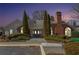 A charming clubhouse at night with well-manicured landscaping and a brick facade, providing a welcoming community space at 1203 Cascade Park Sw Dr, Atlanta, GA 30331