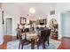Elegant dining area with chandelier and hardwood flooring, perfect for gatherings at 1203 Cascade Park Sw Dr, Atlanta, GA 30331