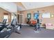 This gym features mirrors, a weight rack, and a rowing machine for fitness and exercise at 1203 Cascade Park Sw Dr, Atlanta, GA 30331