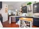Modern kitchen with stainless steel appliances, island, and open layout at 1203 Cascade Park Sw Dr, Atlanta, GA 30331