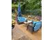Relaxing outdoor patio featuring comfortable seating and views of the landscaped backyard at 1203 Cascade Park Sw Dr, Atlanta, GA 30331