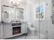 Contemporary bathroom with double vanity, stand up shower, and built in fireplace at 1798 Giben Rd, Atlanta, GA 30315