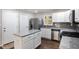 Well-lit kitchen with granite countertops and stainless steel appliances at 1798 Giben Rd, Atlanta, GA 30315