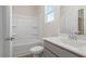 Bathroom featuring a modern vanity with sleek faucet, framed mirror and a shower and tub combo at 108 Black Gum Unit 38 Ln, Auburn, GA 30011
