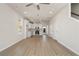 Open floor plan combines the living area and kitchen, with modern appliances and stylish lighting at 108 Black Gum Unit 38 Ln, Auburn, GA 30011