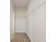 Efficient walk-in closet with wire shelving and space saving storage, perfect for organization at 108 Black Gum Unit 38 Ln, Auburn, GA 30011