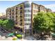 Elegant condo building with well-manicured landscaping and street access at 201 W Ponce De Leon Ave # 315, Decatur, GA 30030