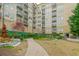 Multi-story building with courtyard that showcases lush landscaping and inviting outdoor spaces at 201 W Ponce De Leon Ave # 315, Decatur, GA 30030