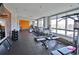 Community gym with diverse equipment, natural light, and an inviting atmosphere for a comprehensive workout experience at 201 W Ponce De Leon Ave # 315, Decatur, GA 30030