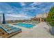 Breathtaking rooftop community pool with comfortable seating, colorful umbrellas, and city views for a luxurious retreat at 201 W Ponce De Leon Ave # 315, Decatur, GA 30030