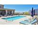 Relaxing rooftop community pool area features comfortable lounge seating, umbrellas, and landscaped views at 201 W Ponce De Leon Ave # 315, Decatur, GA 30030