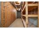 Unfinished basement with shelves and plenty of space for storage at 5960 Camelia Dr, Douglasville, GA 30135