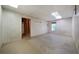 Unfinished basement space with paneled walls and possible storage space at 5960 Camelia Dr, Douglasville, GA 30135