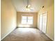 Bedroom featuring carpet, window, and closet at 5960 Camelia Dr, Douglasville, GA 30135