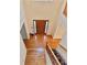 View of foyer featuring wood floors, staircase, and front door with sidelights at 5960 Camelia Dr, Douglasville, GA 30135