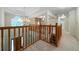 Elegant foyer with a chandelier, staircase, and view of the open loft area, welcoming guests at 5960 Camelia Dr, Douglasville, GA 30135