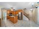 Well-equipped kitchen boasts stainless steel appliances and center island with granite countertops at 5960 Camelia Dr, Douglasville, GA 30135