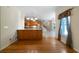 Open concept kitchen with views to dining room and stairway at 5960 Camelia Dr, Douglasville, GA 30135