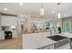 Bright kitchen featuring a study nook and open concept view of living spaces at 133 Frontier Way, Mcdonough, GA 30253
