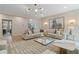 Inviting living room with a comfortable sofa, decorative lighting, and stylish decor accents at 133 Frontier Way, Mcdonough, GA 30253