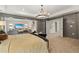 A luxury main bedroom suite offers a sitting room and a spacious open floorplan at 133 Frontier Way, Mcdonough, GA 30253