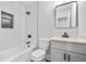 Modern bathroom features a new vanity, tub, shower, and stylish tile work at 2111 Glenwood Downs Dr, Decatur, GA 30035
