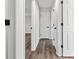 Bright hallway features modern flooring and fresh paint throughout at 2111 Glenwood Downs Dr, Decatur, GA 30035
