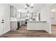 Modern kitchen with stainless steel appliances, white countertops, subway tile backsplash and eat-in bar at 2111 Glenwood Downs Dr, Decatur, GA 30035