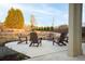 Inviting outdoor patio with Adirondack chairs, perfect for relaxing and enjoying the landscaped surroundings at 51 Hydrangea Unit 74 Way, Auburn, GA 30011