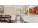 Spacious entryway with high ceilings, decorative molding, and an open view into the kitchen and living areas at 106 Dustin Dr, Stockbridge, GA 30281