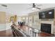 Bright and open living room features a fireplace and an eat-in kitchen with lots of natural light at 106 Dustin Dr, Stockbridge, GA 30281