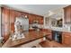 Kitchen featuring stainless steel appliances, ample cabinets, and a butcher block island at 113 Brianna Way, Woodstock, GA 30188